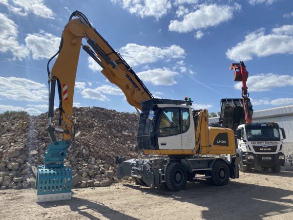 excavator on a demolition yard.